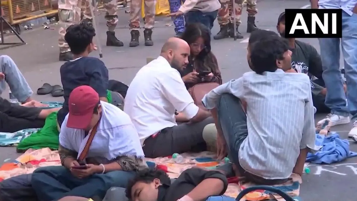 Delhi journalist detained again as protesters press for inquiry