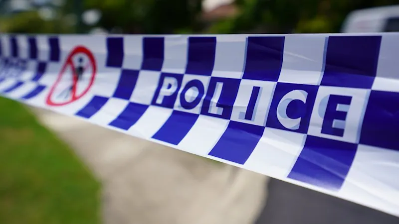Man charged after body found in Queensland unit